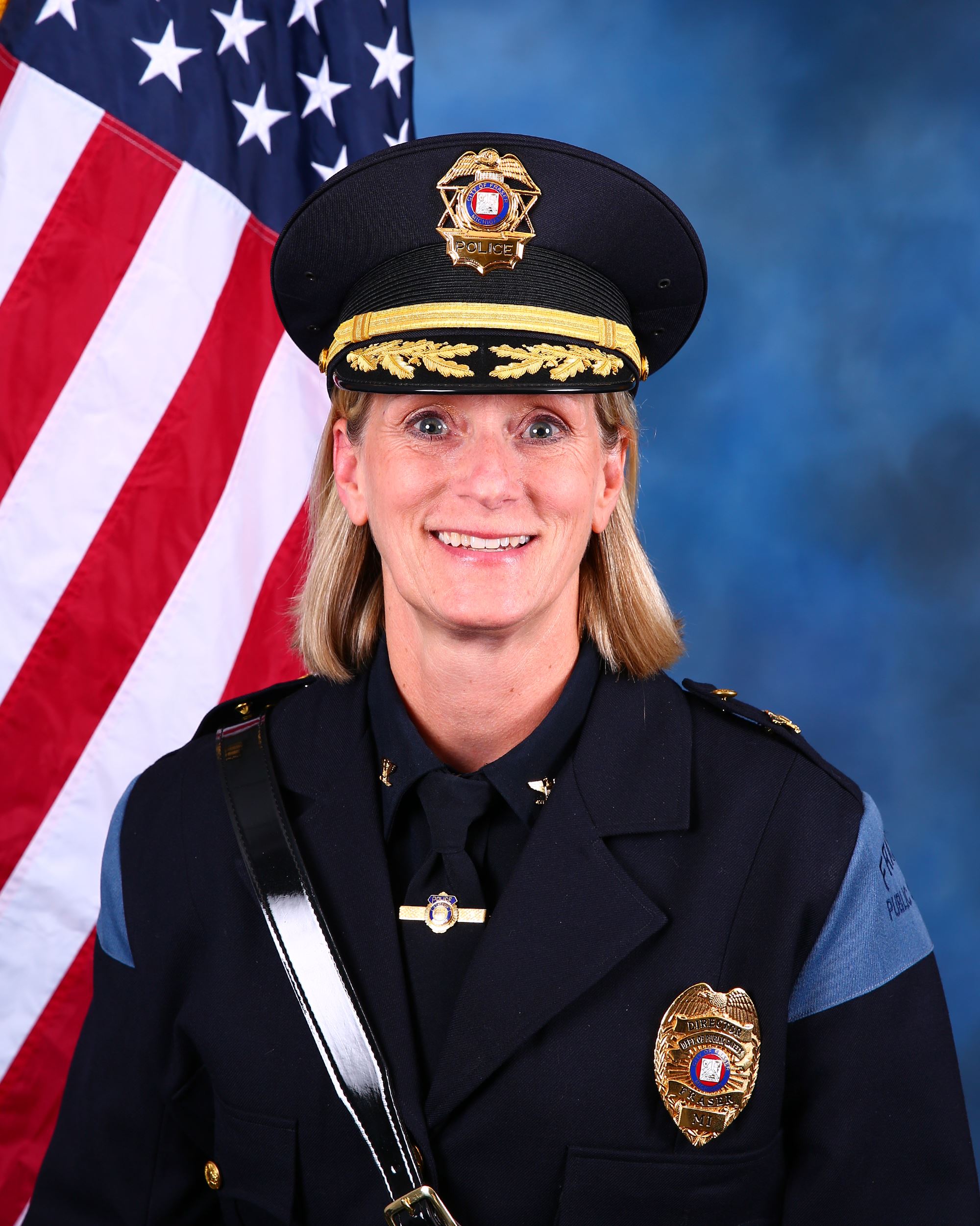 Official portrait of Fraser’s Director of Public Safety. Mother relationship reported separately; no case intervention established.